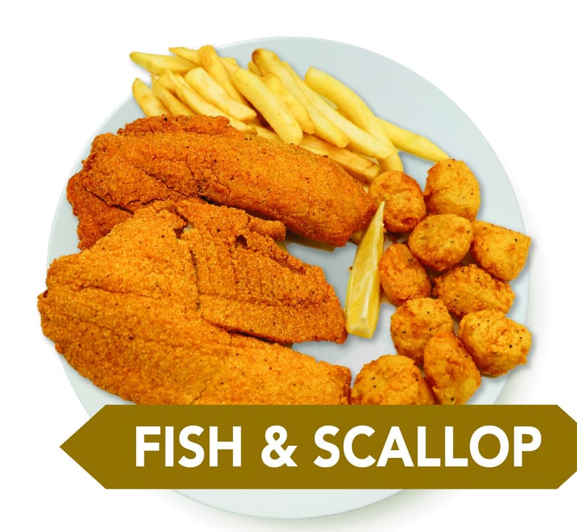 Fried fish fillets, scallops, french fries, and a lemon wedge on a white plate.